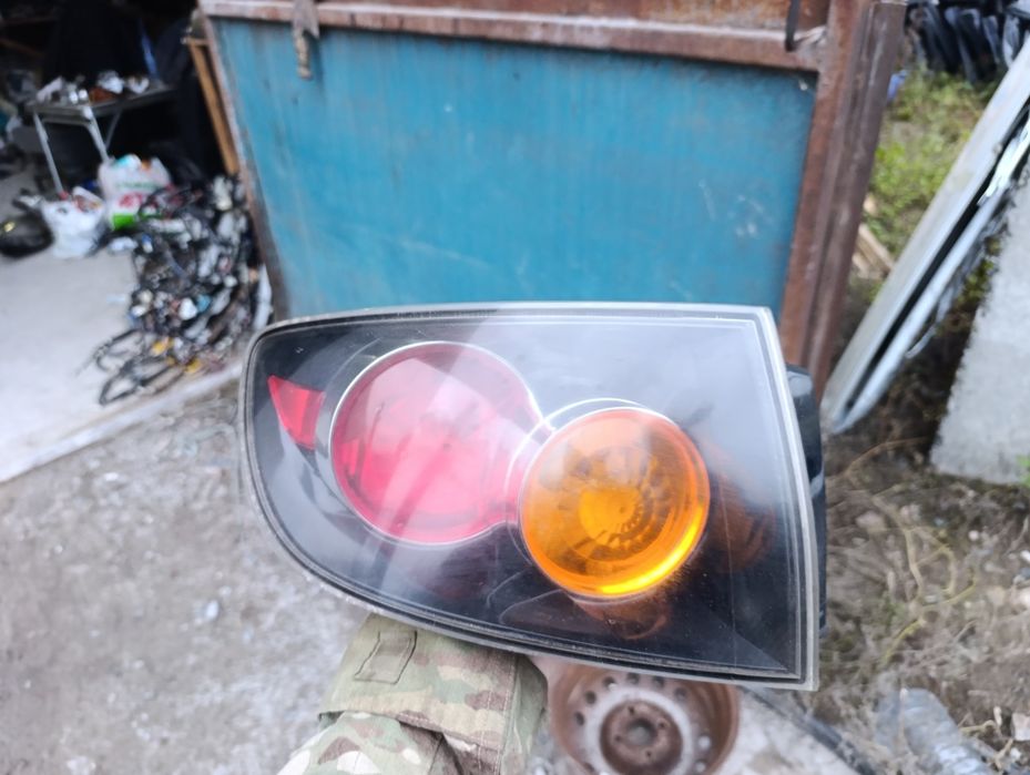 Фонарь задний левый Mazda 3 BK 2003-2009 седан Оригинал