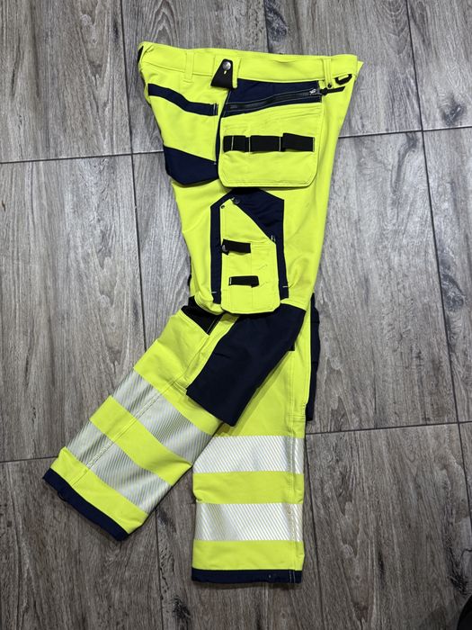 Meskie rzemieślnicze spodnie robocze BLAKLADER Stretch Hi Vis roz C56