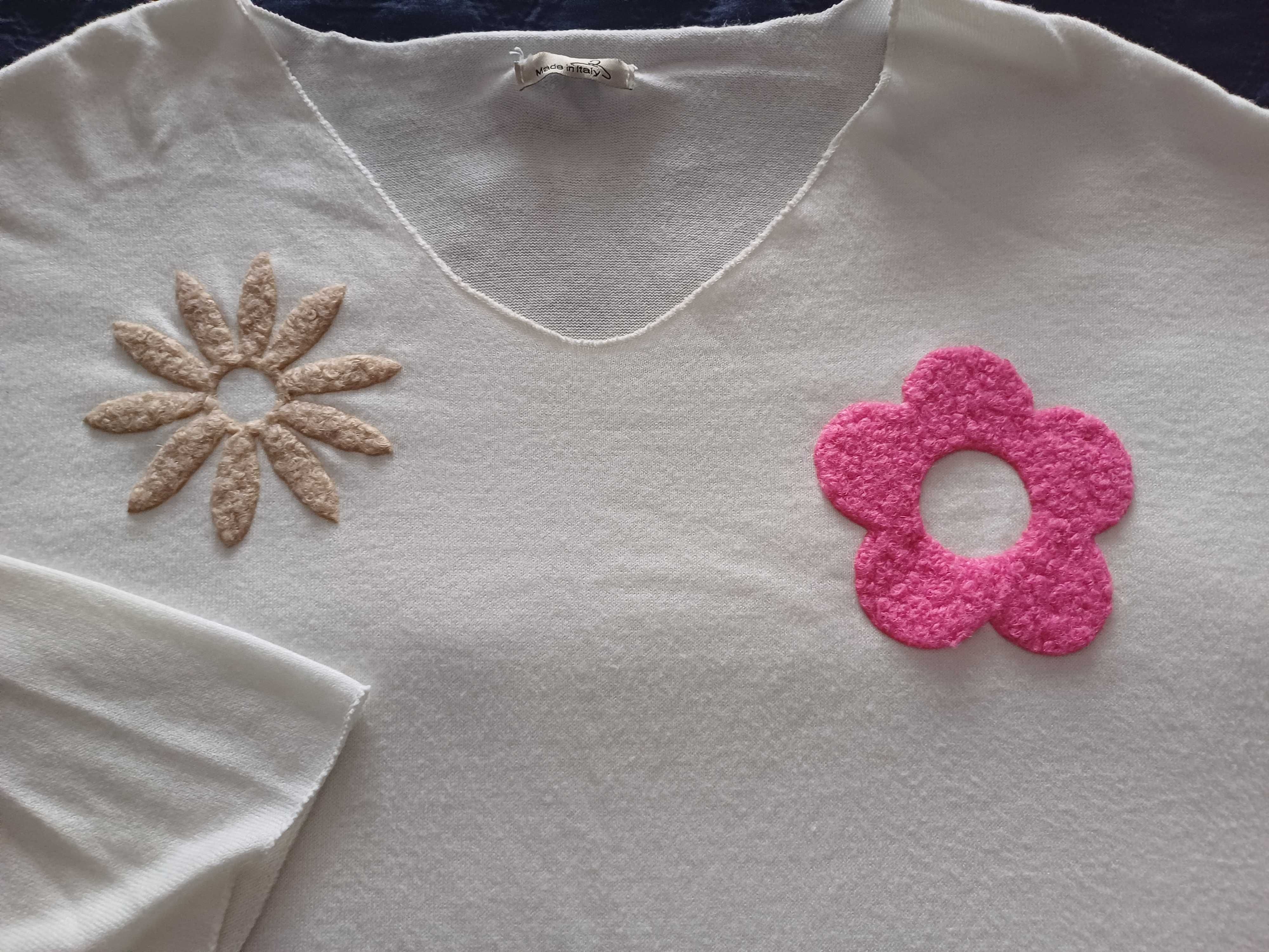 Sweter z aplikacjami.