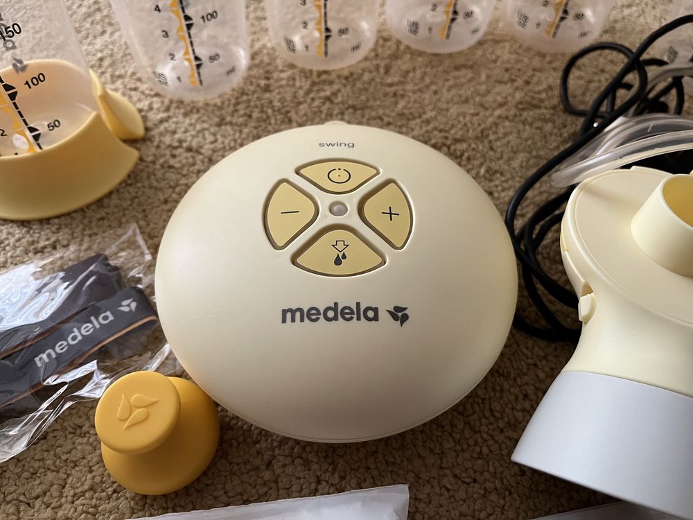 Kit Medela (Bomba de extratora de leite + colector + biberoes