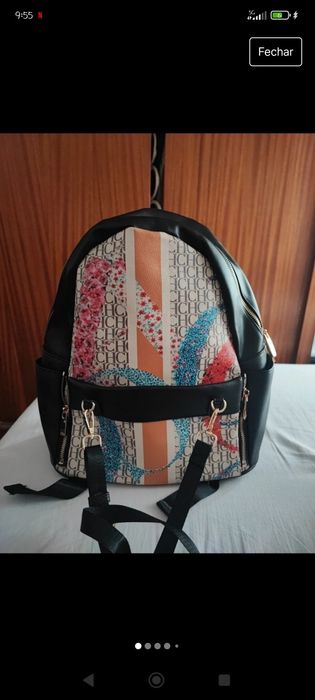 Mochila CAROLINA HERRERA com clutch