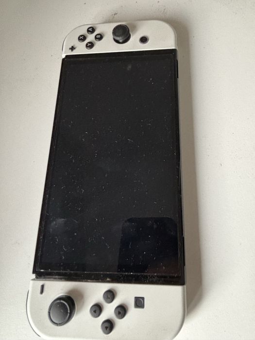 Nintendo Switch OLED + białe Joy-Cony + gry + Nitro Deck