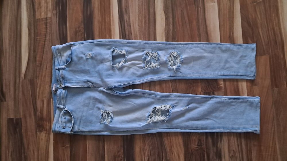 Spodnie z dziurami 48/52