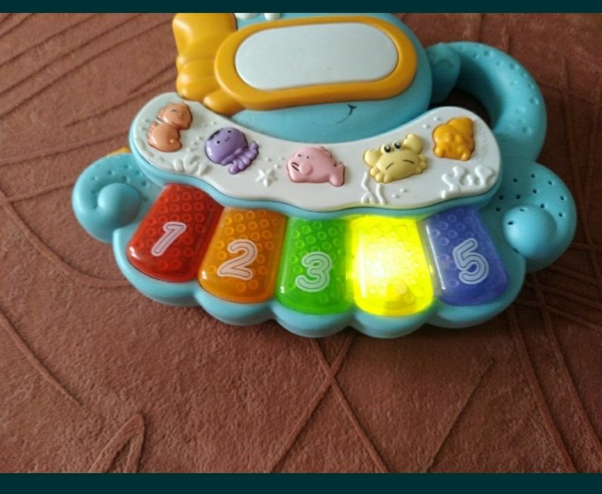 Игрушка музыкальный краб.