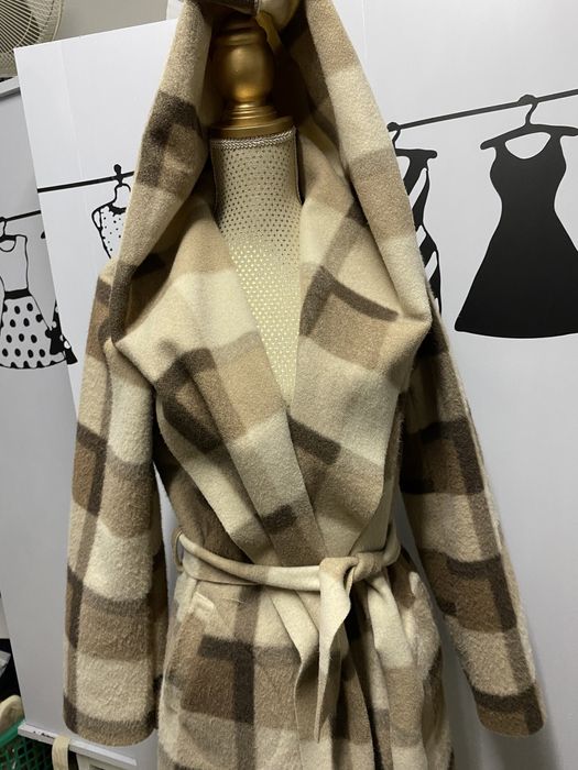 Casaco comprido muito pratico