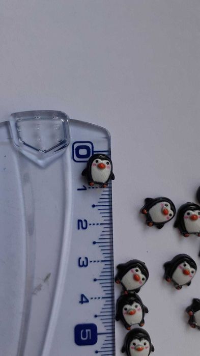 Pinguins em resina miniatura