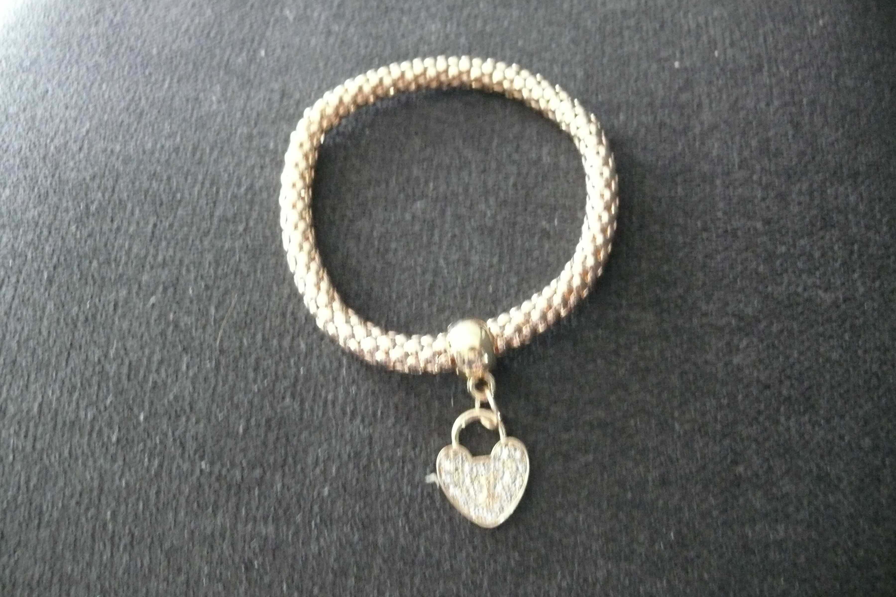 Pulseiras metal com pendente coração