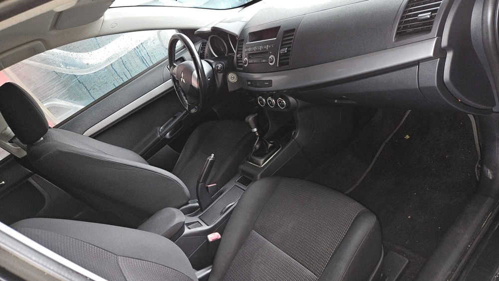 Mitsubishi Lancer 1.5b 109KM