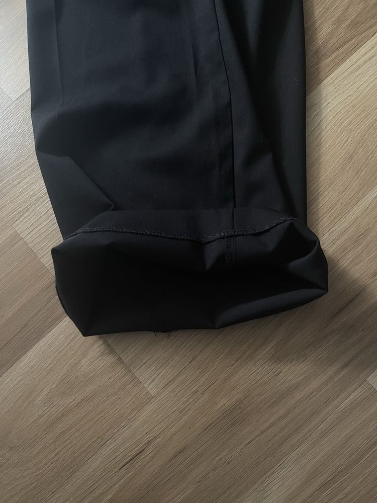 Eleganckie spodnie w kant czarne Reserved M