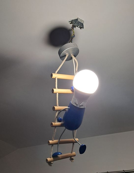 Lampa ludzik na drabinie