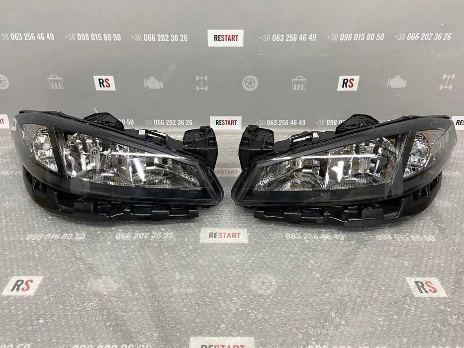 Фари передні з кронштейном Renault Laguna Рено Лагуна 05-07р 770106167