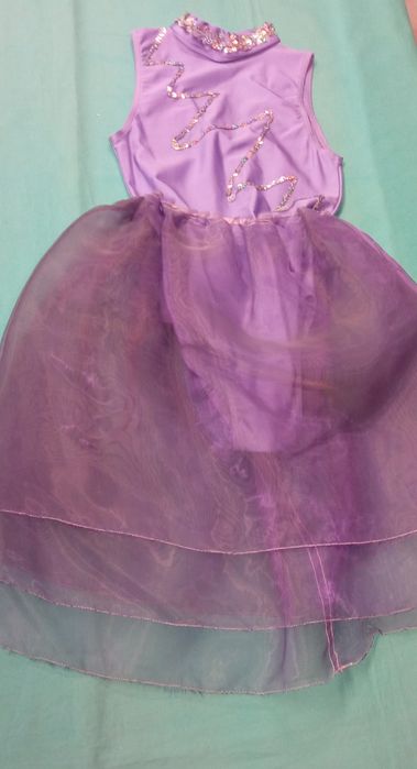 Strój karnawałowy dziewczęcy: łyżwiarka 134cm