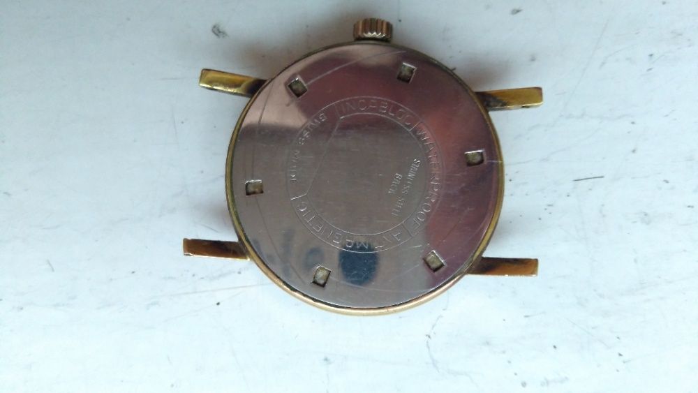 Zegarek męski , szwajcarski , pozłacany , mechaniczny , firmowy .