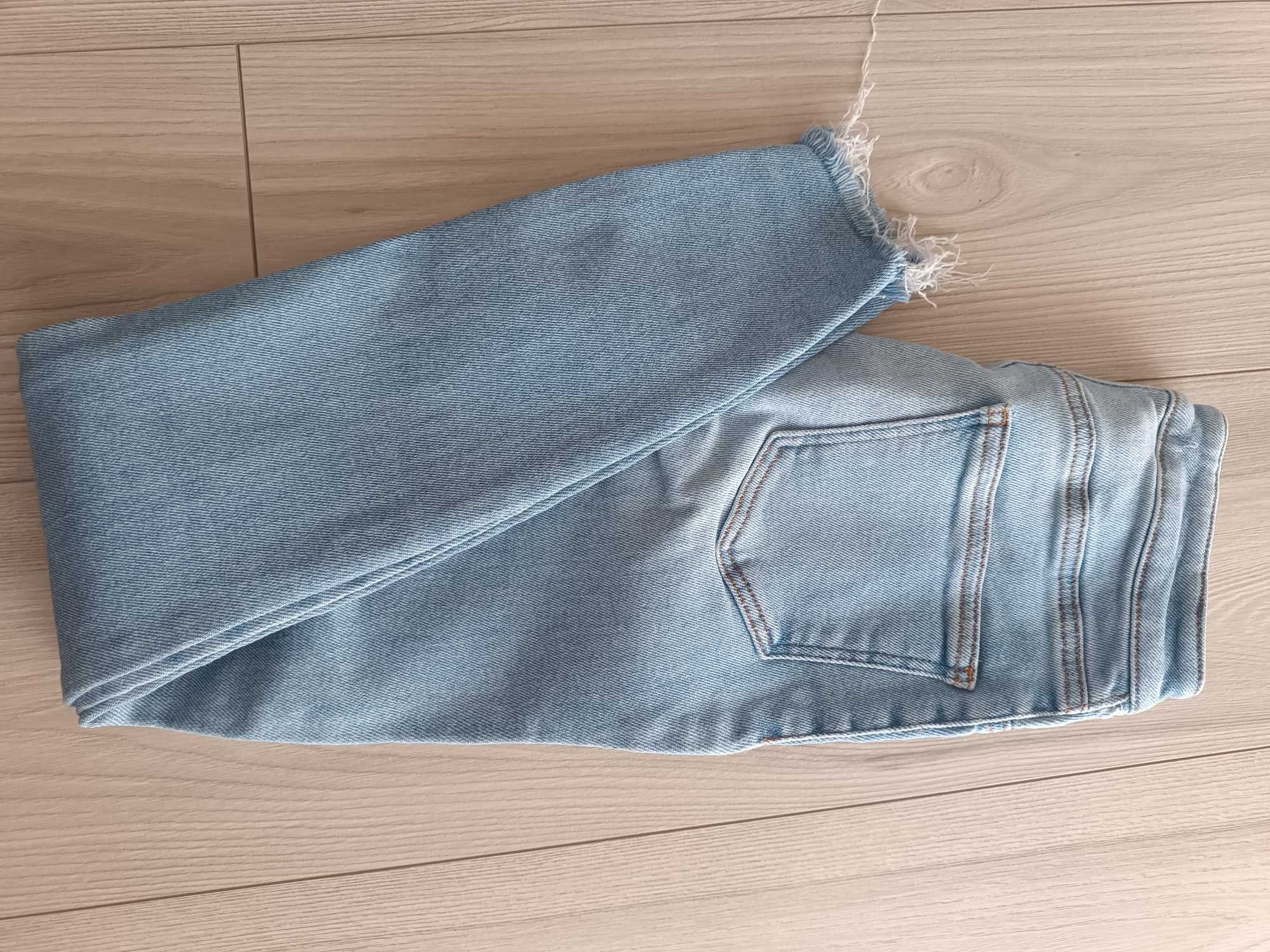 Spodnie damskie jeansowe z przetarciami Skinny używane, rozmiar 36