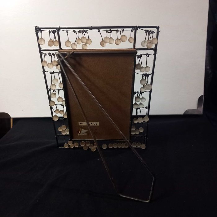 Invulgar moldura anos 30