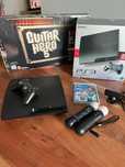 PS3 com Guitar Hero e Move Fitness