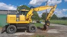 Koparka kołowa Komatsu PW 140-7 z rototilt, 10170  motogodzin