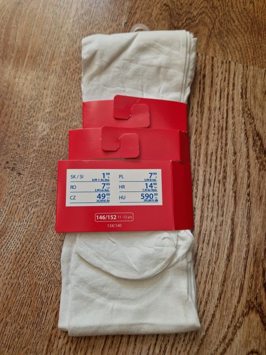 Nowe białe rajstopy r.140