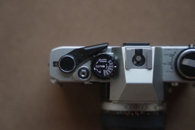 Máquina analógica Olympus + 2 lentes + filtro