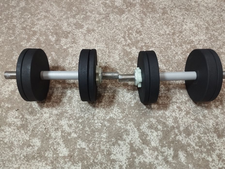 Продам нові, металеві, розбірні гантелі по 14 кг., кожна.