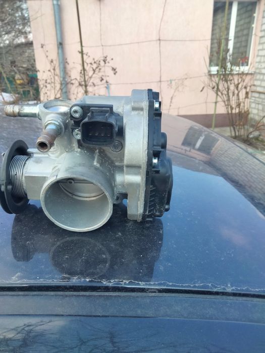 Продам дросильную заслонку