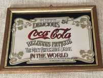 Reklama Coca Cola na lustrze