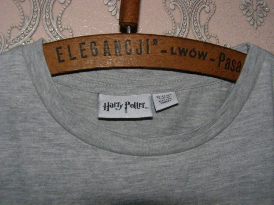 Жіноча женская футболка Harry Potter з гербом, що переливається