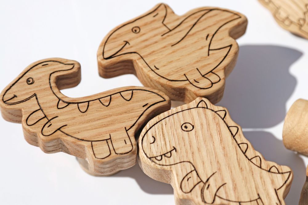 Uchwyty meblowe "Dinozaury" do pokoju dziecięcego