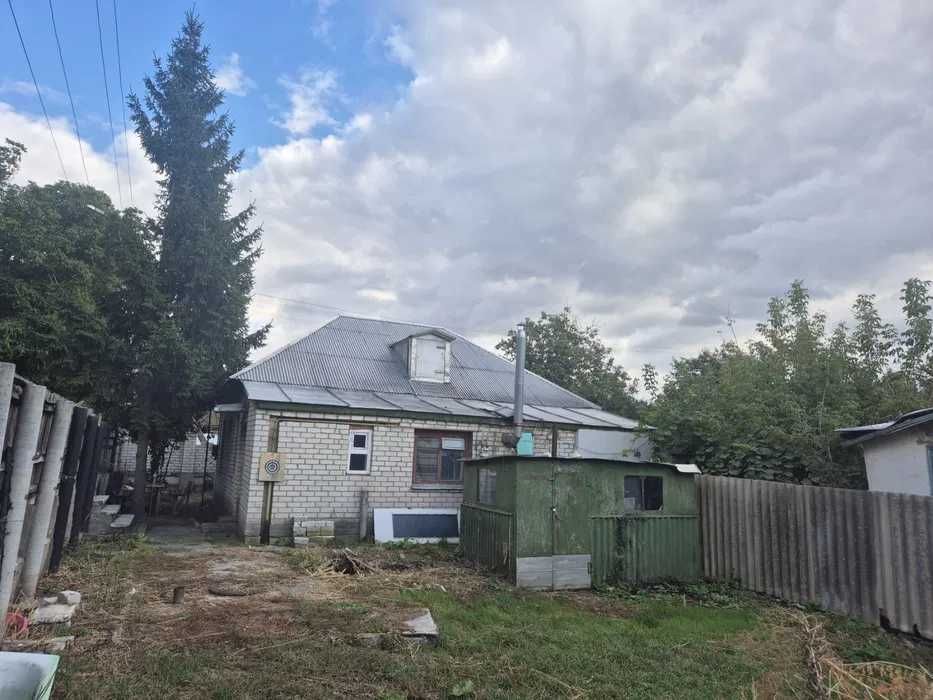 Продам половину будинку з власною землею р-н Громова (Черкаси-Газ)