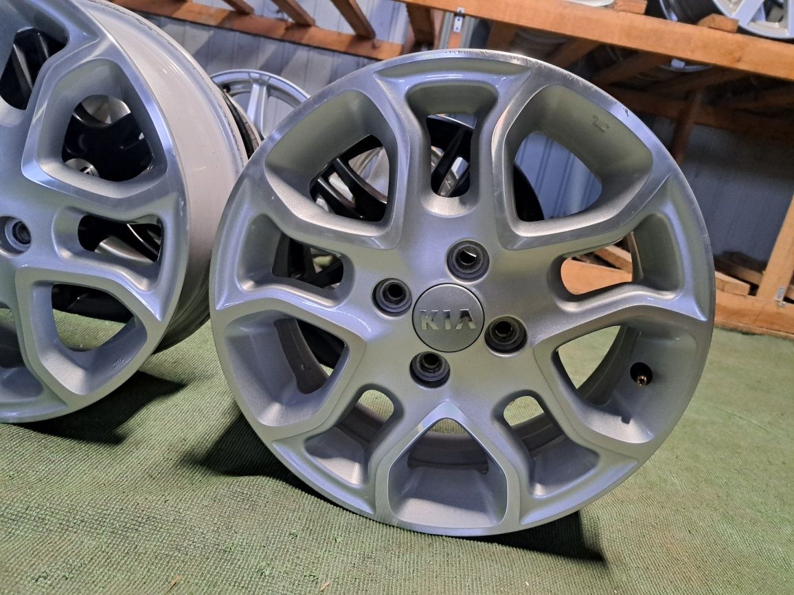 05 TSM alufelgi 4x100 5.5x15 et52 54.1 kia oryginalne srebrne polerowa