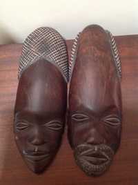 Par de máscaras em madeira africana, com 28 cm