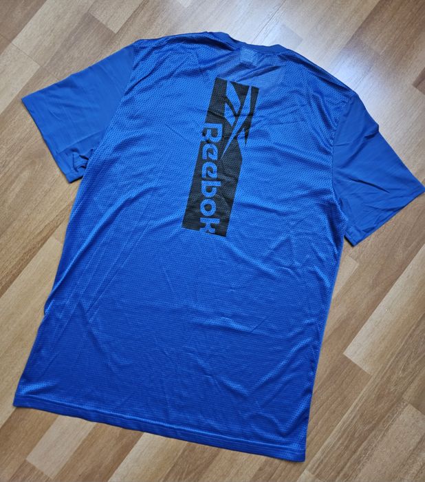 Продам футболку для бега , занятием спортом Reebok.