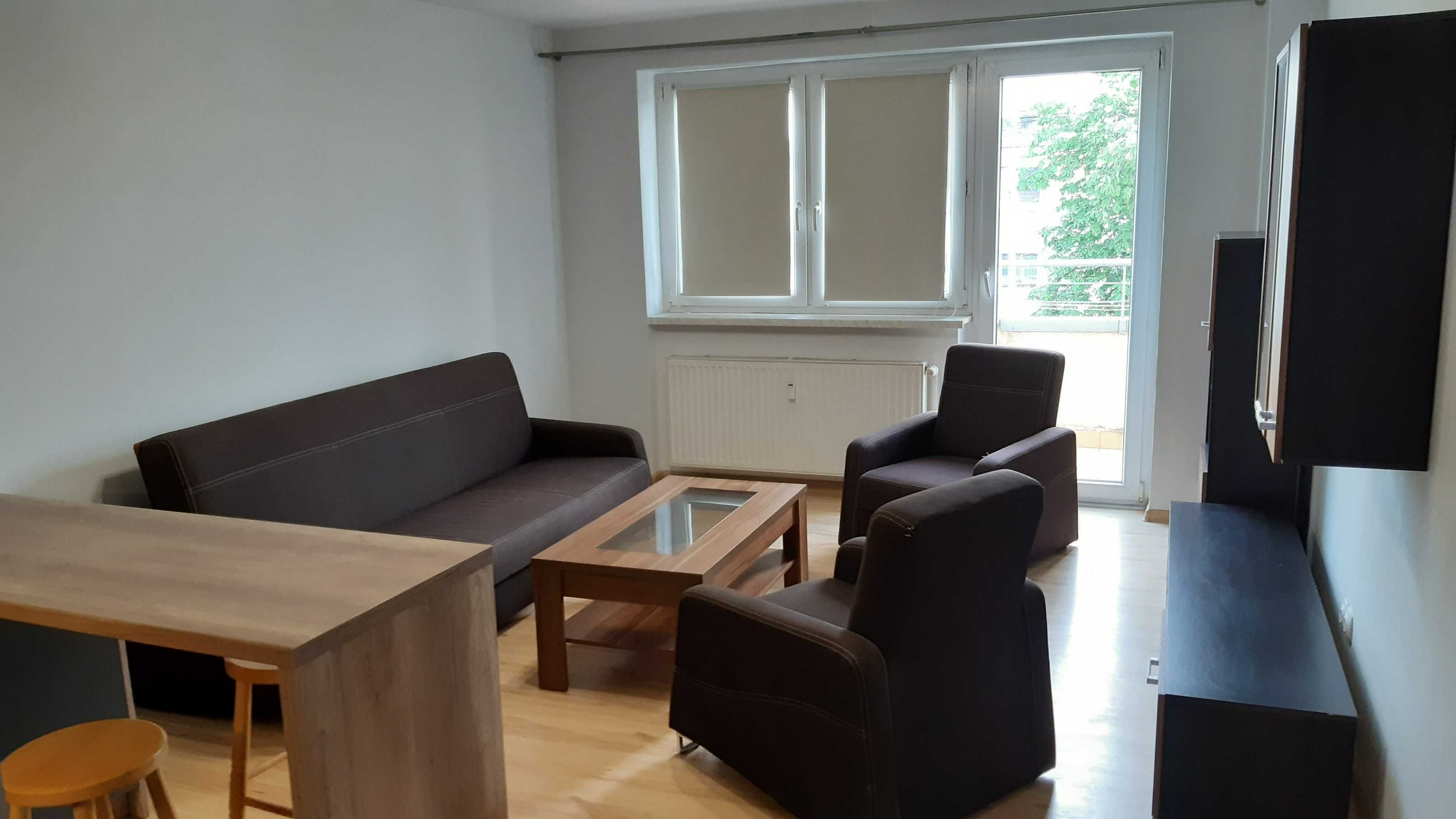 Wersalka rozkładana z funkcją spania oraz dwa fotele