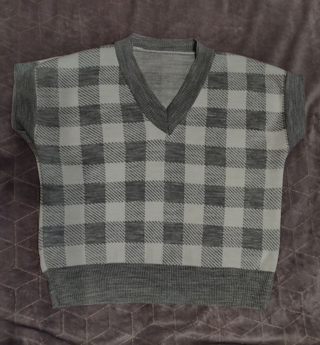 Жилетка в клітинку