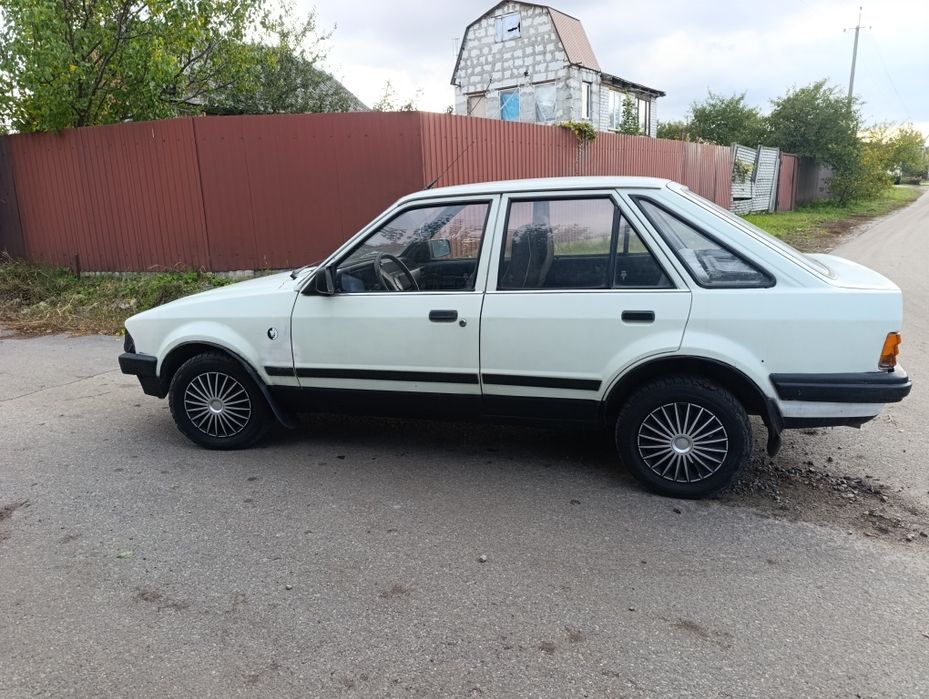 Форд эскорт газ/бензин