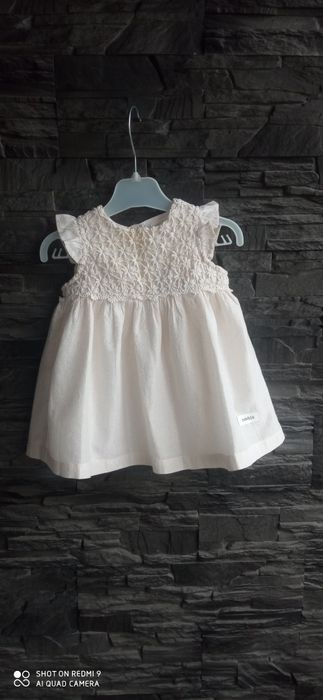 Kremowa świąteczna sukienka Newbie r. 68