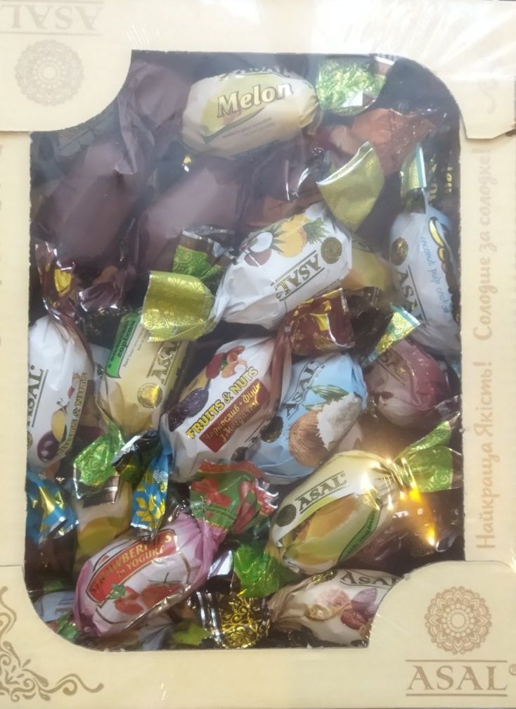 Шоколадні цукерки з різноманітною начинкою