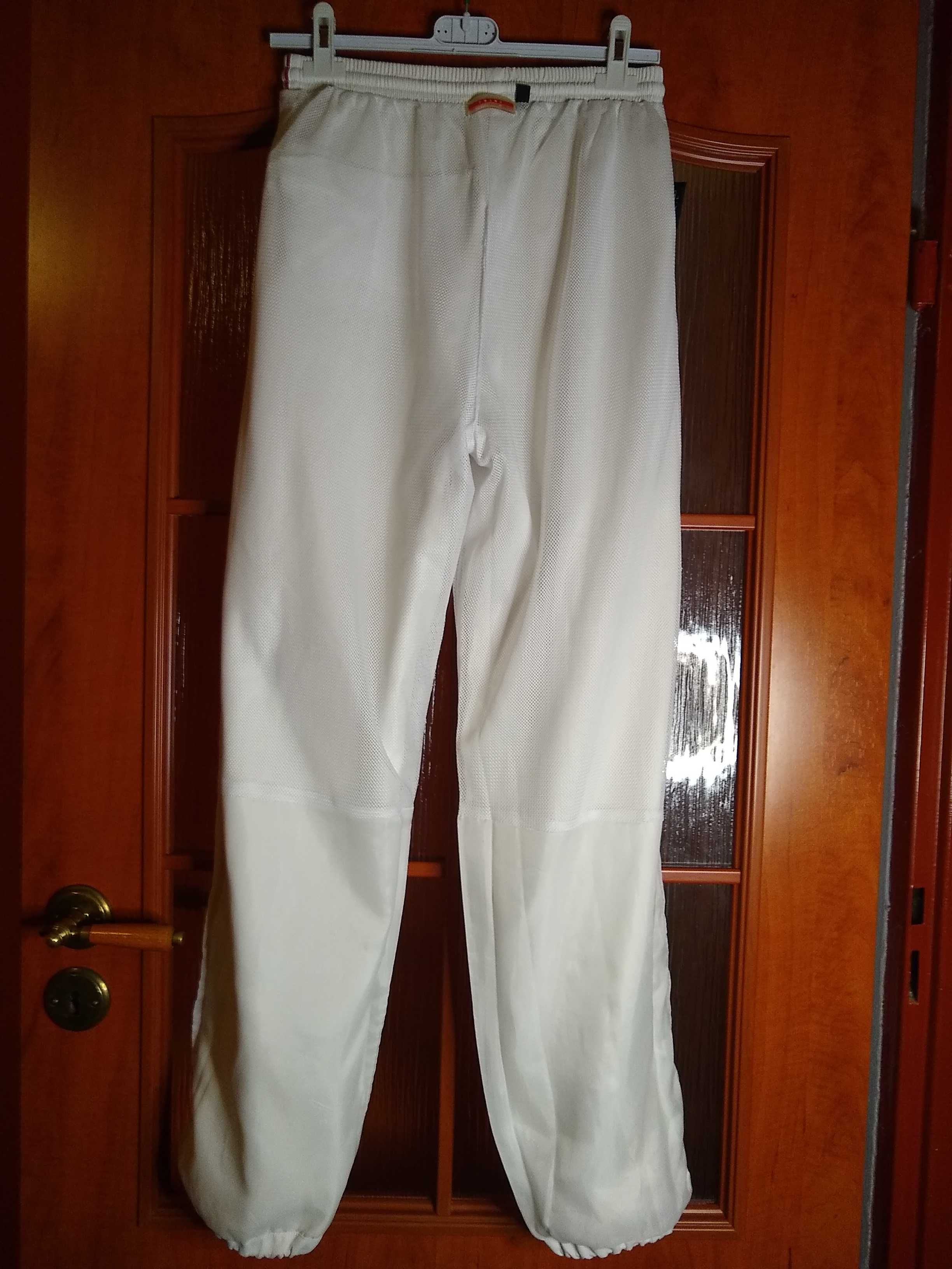 NOWE  Damskie białe spodnie sportowe z siateczkową podszewką,  L-XL