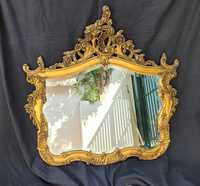 Espelho vintage com moldura em madeira dourada