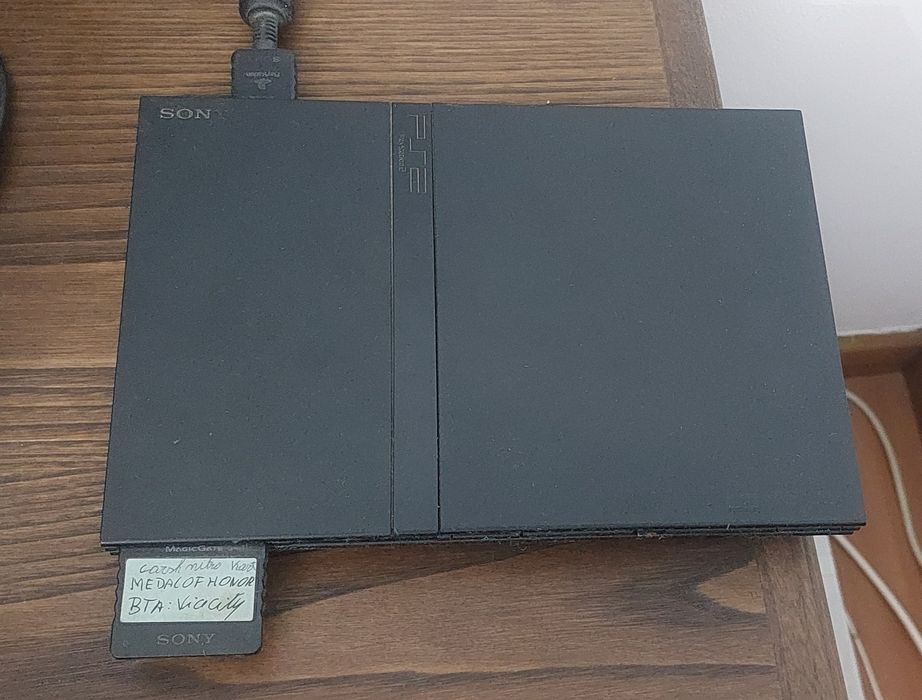 PS2 with Additional Games in Original Condition64729401033090121