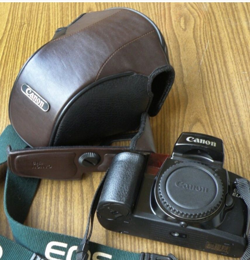 Canon EOS 100 Elan 35mm SLR Film Camera Body з ориг. футляром і ремінц