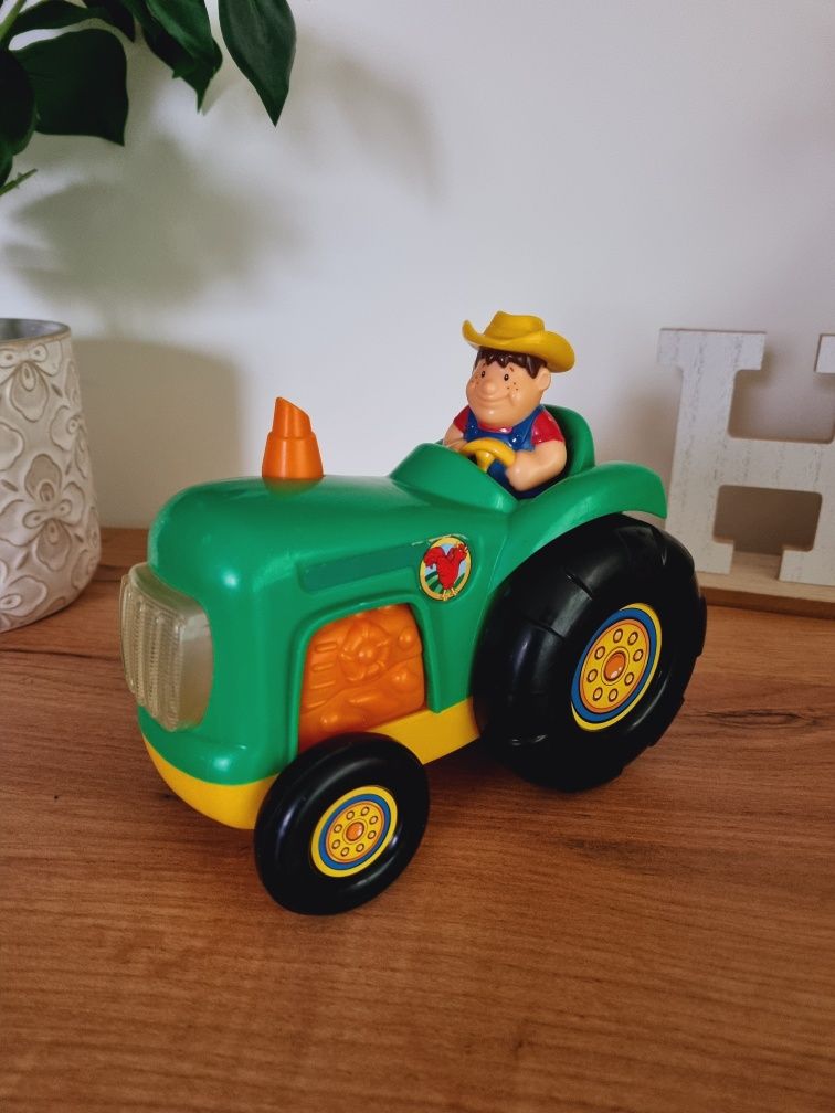 Zabawka traktor ciągnik z farmerem Dumel