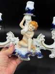 Porcelanowy świecznik z amorkiem