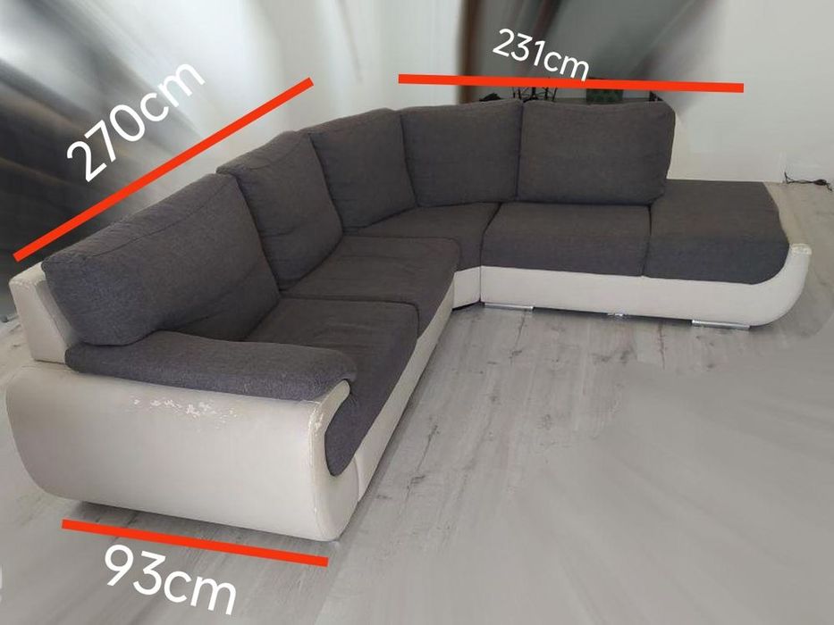 Sofá de canto cinzento e branco