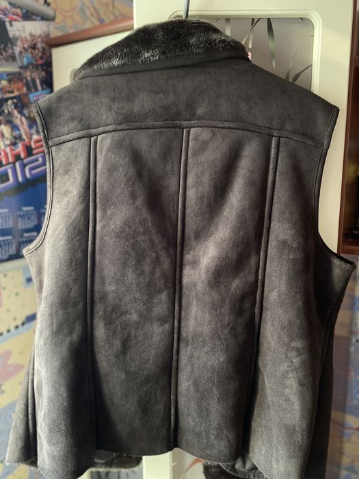 Теплая меховая жилетка