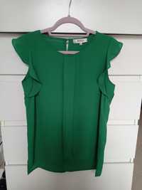 Blusa verde com detalhe