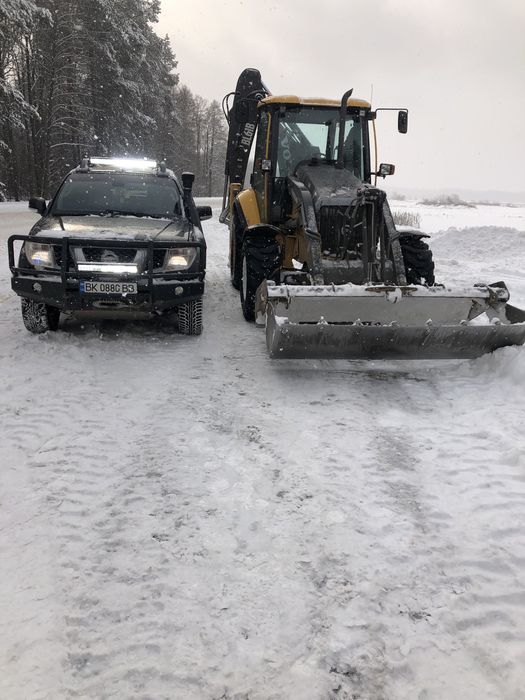 Послуги ескаватора-навантажувача