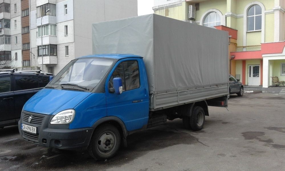 Перевезення вантажів. Квартирний переїзд. Вантажники. Грузоперевозка