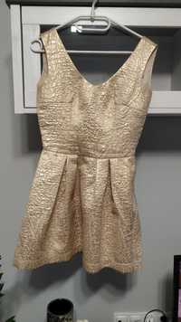 Złota sukienka rozkloszowana S 36