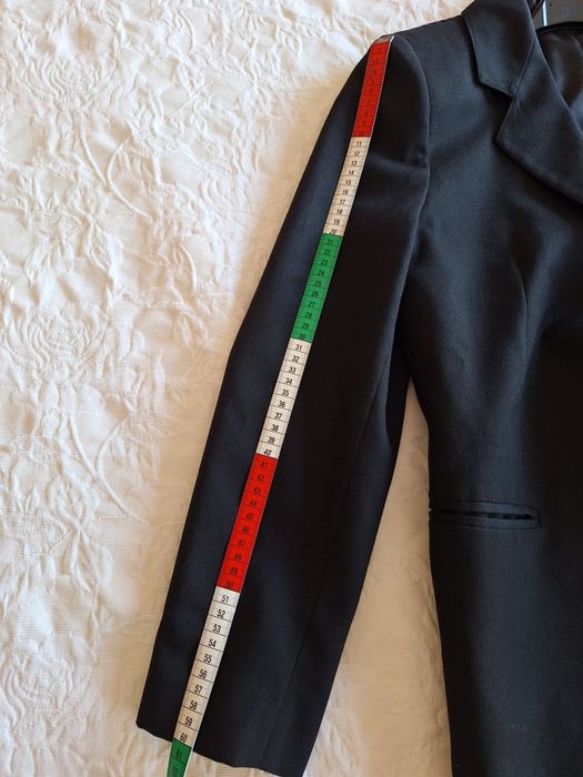 Traje feminino. Tamanho S